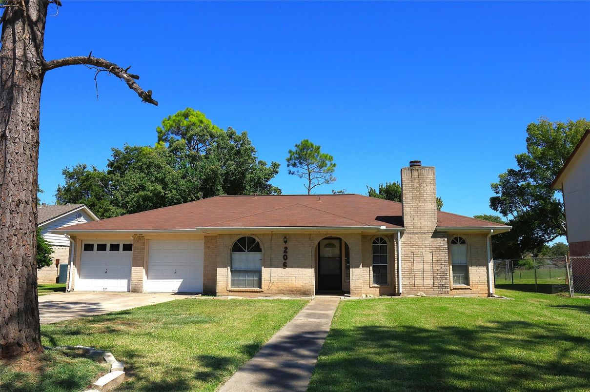 Attached, Backyard, Exterior, Facade, Brick Facade, Ranch