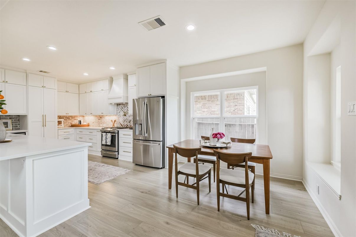 Dining room, Interior, Kitchen, Recessed Lighting, Stainless Steel Appliances, Wood Texture Flooring