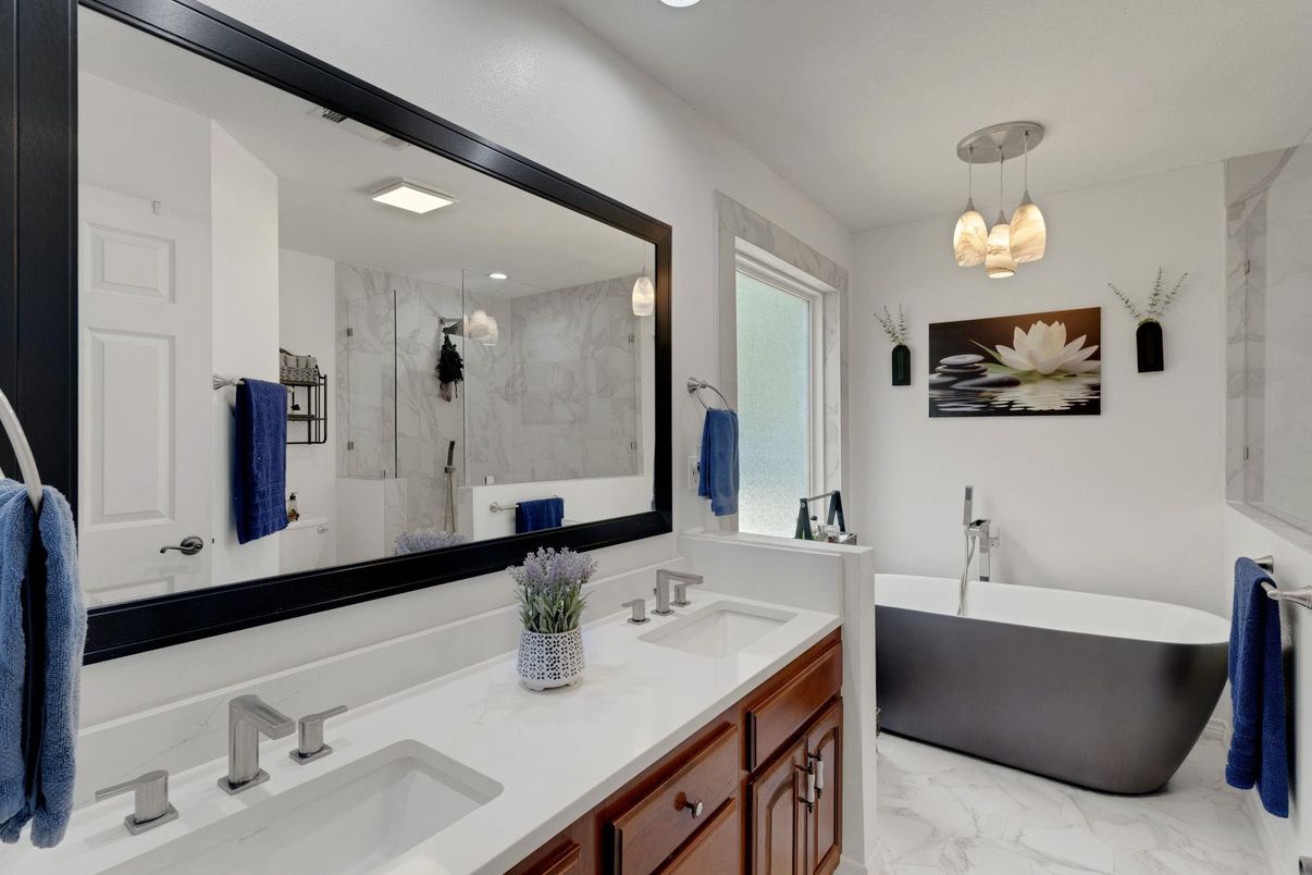 Bathroom, Dual Sink Vanities, Free Standing Baths, Glass Shower, Interior, Marble, Marble Walls, Pendant Lights, Recessed Lighting