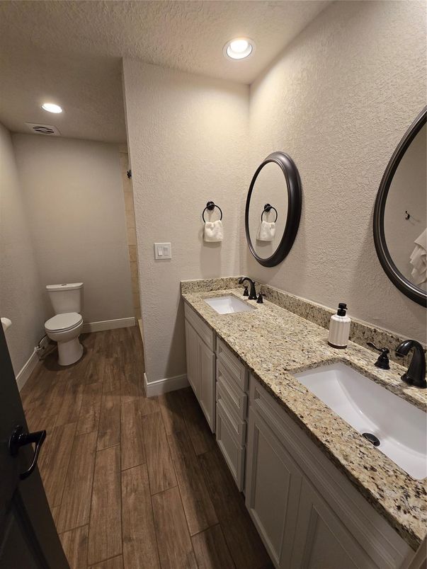 Bathroom, Dual Sink Vanities, Interior, Recessed Lighting, Wood Texture Flooring