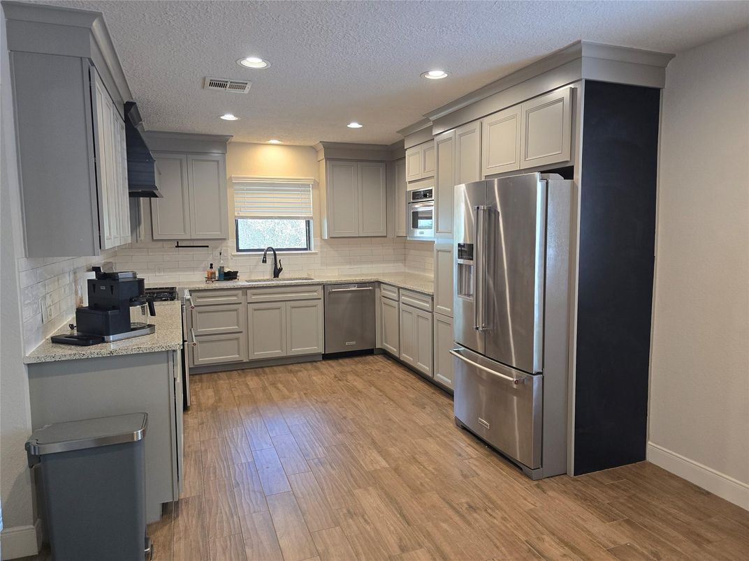 Interior, Kitchen, Recessed Lighting, Stainless Steel Appliances, Wood Texture Flooring
