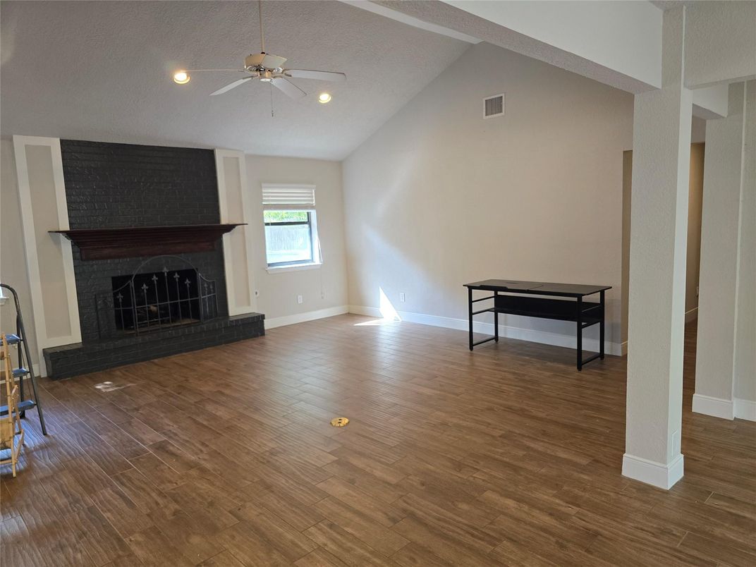 Empty room, Fireplace, Interior, Recessed Lighting, Wood Texture Flooring
