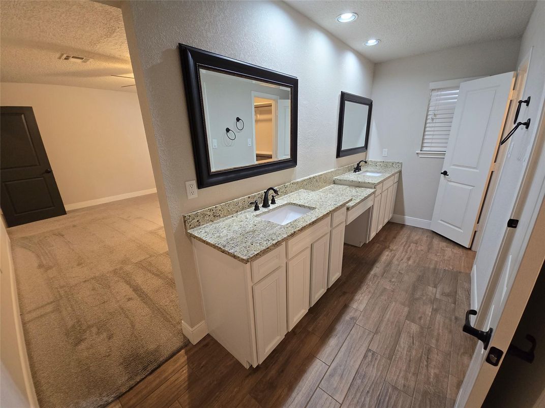 Bathroom, Dual Sink Vanities, Interior, Recessed Lighting, Wood Texture Flooring