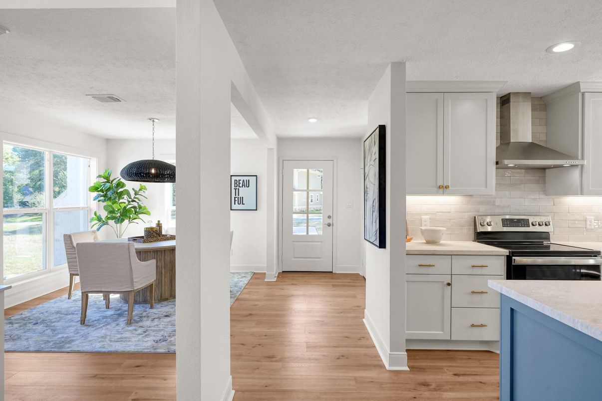Dining room, Interior, Kitchen, Pendant Lights, Recessed Lighting, Stainless Steel Appliances, Wood Texture Flooring