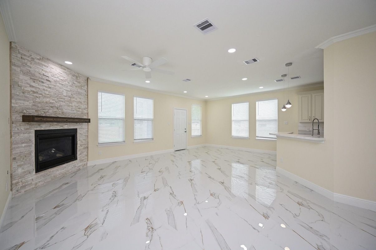 Empty room, Fireplace, Interior, Marble, Pendant Lights, Recessed Lighting, Stone Walls