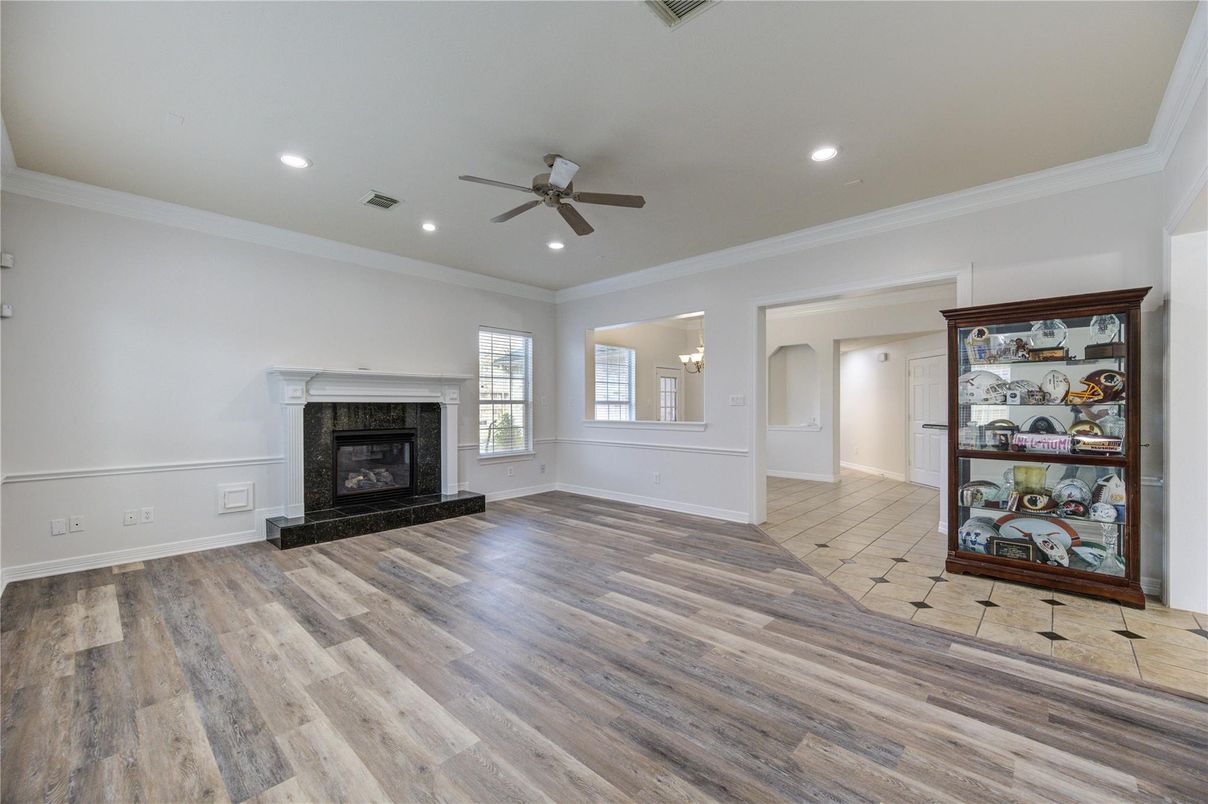 Empty room, Fireplace, Interior, Recessed Lighting, Wood Texture Flooring