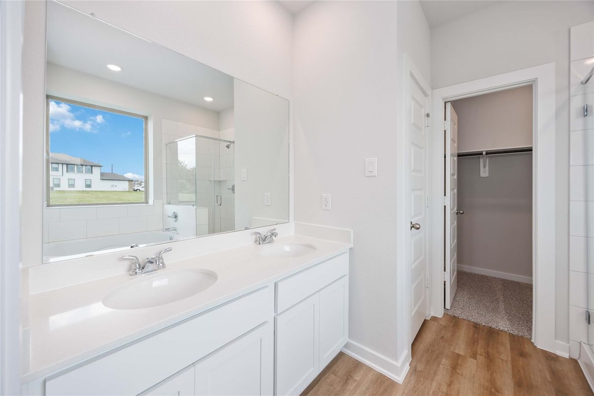Bathroom, Dual Sink Vanities, Glass Shower, Interior, Recessed Lighting, Wood Texture Flooring