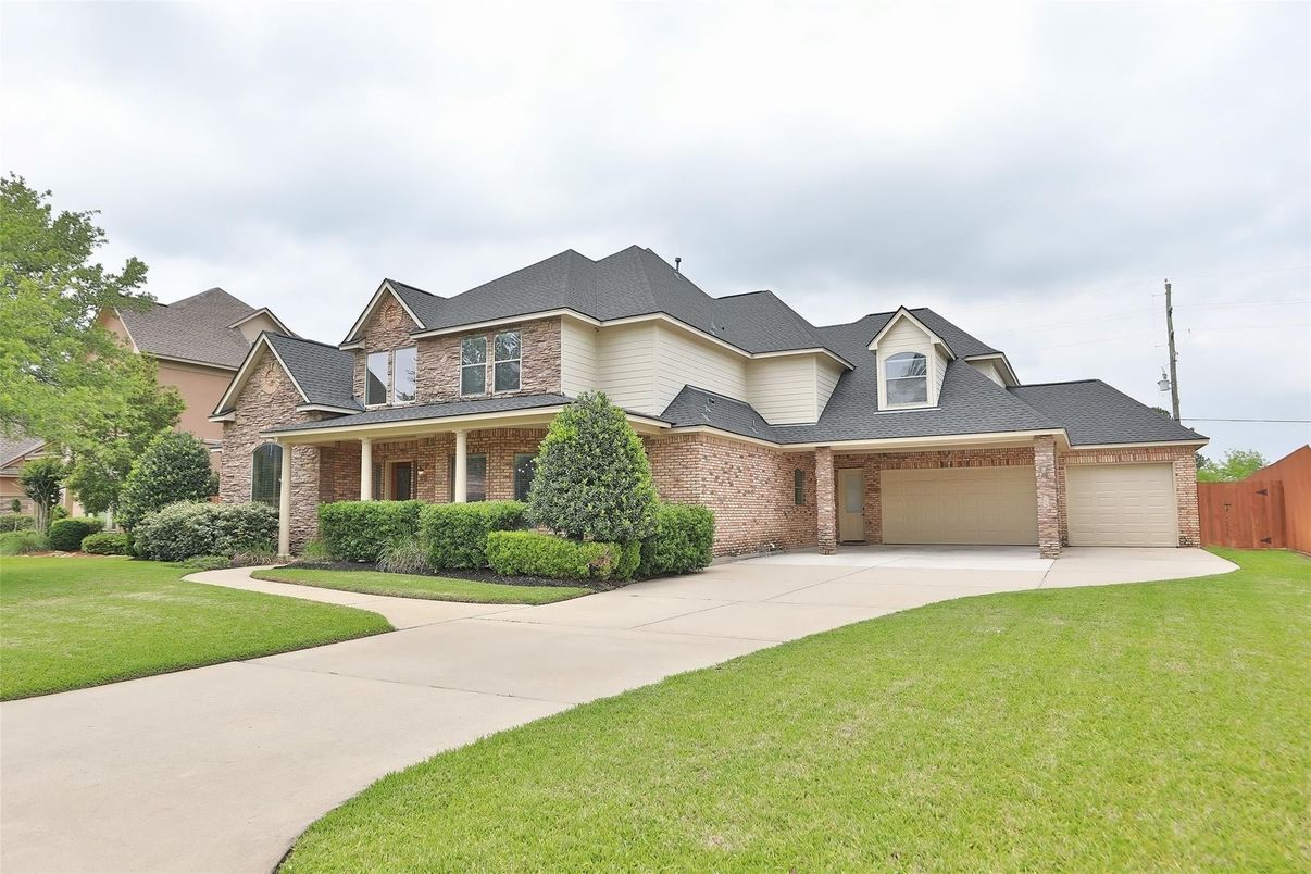 Attached, Exterior, Facade, Brick Facade, French Provincial