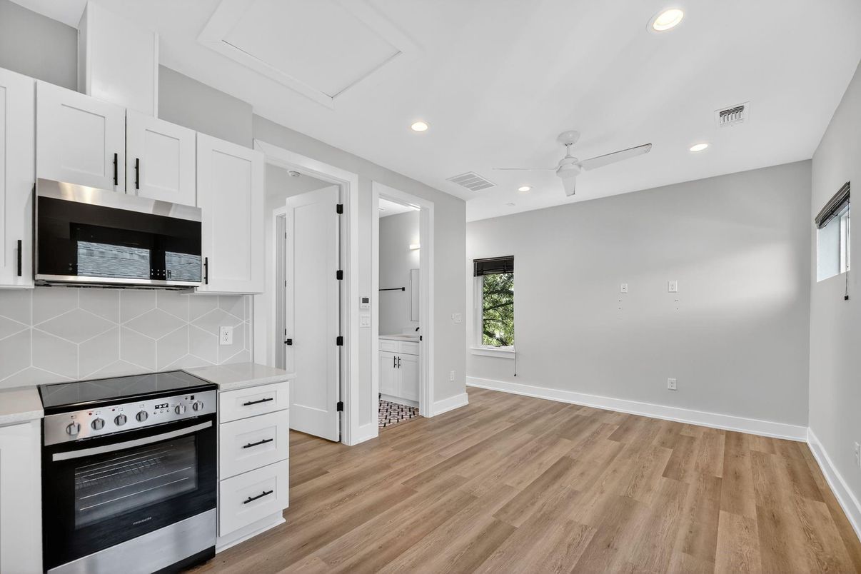 Interior, Kitchen, Recessed Lighting, Stainless Steel Appliances, Wood Texture Flooring