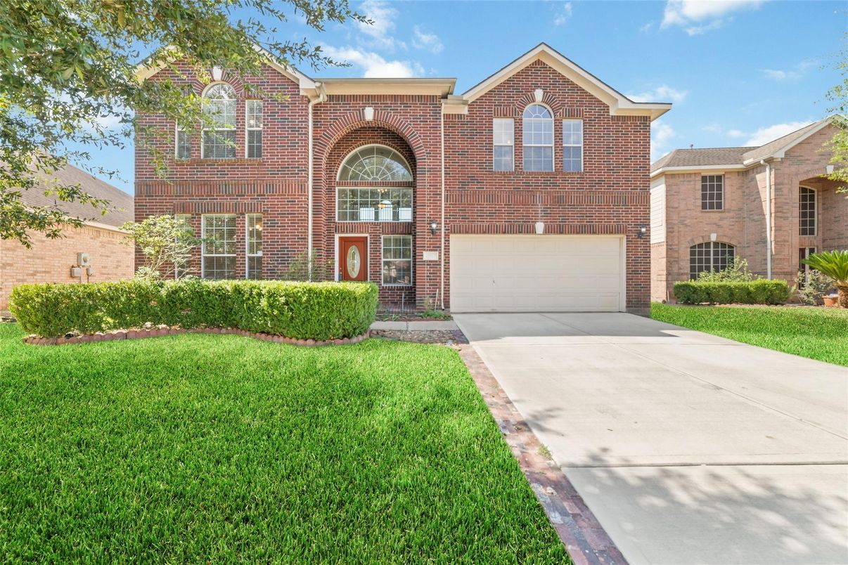 Attached, Exterior, Facade, Brick Facade, Brick Traditional