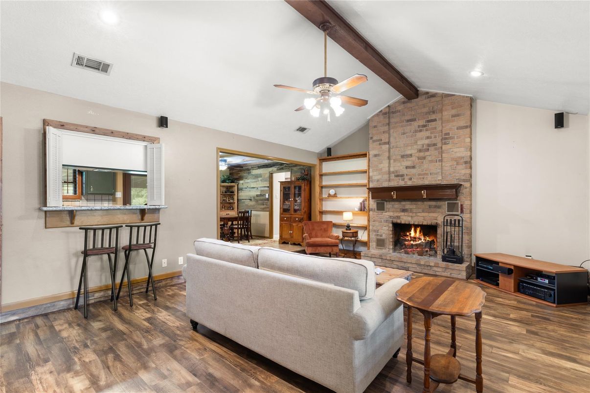 Fireplace, Interior, Living room, Recessed Lighting, Stone Walls, Wooden Beams, Wood Texture Flooring