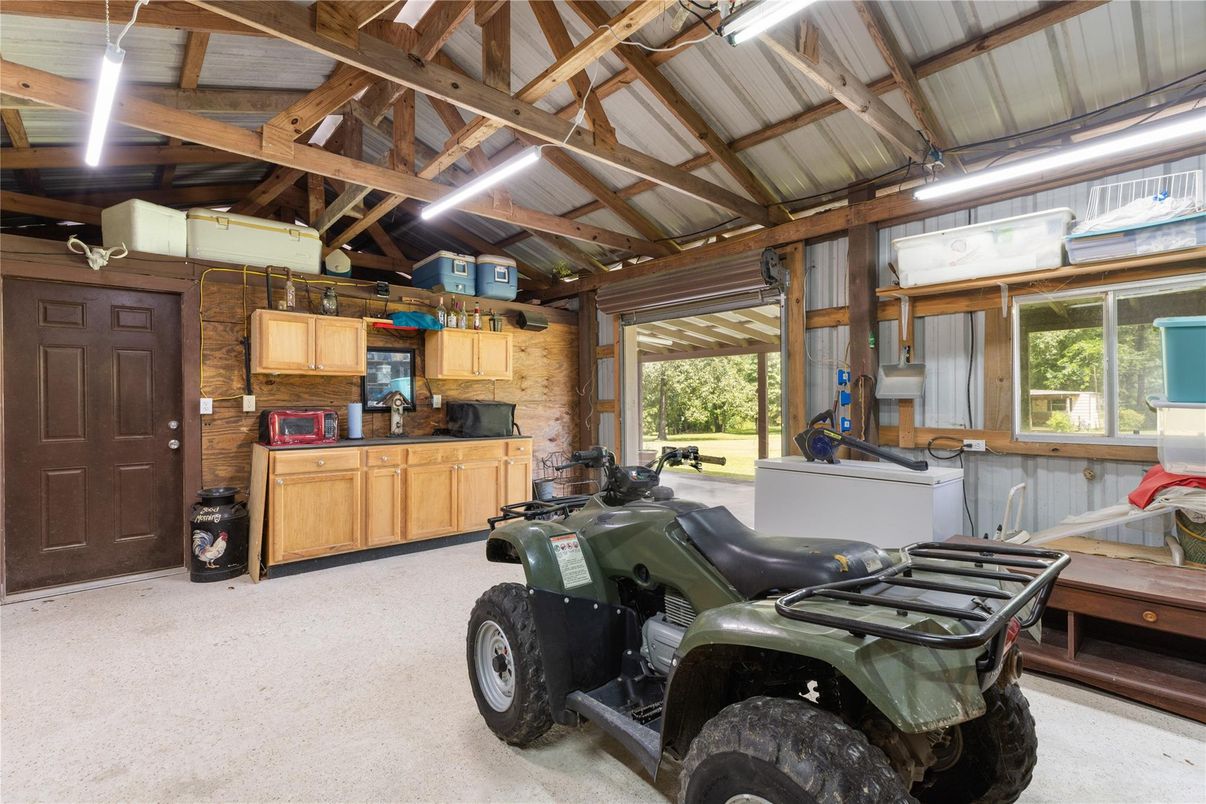 Garage, Interior, Stone Walls, Wooden Beams