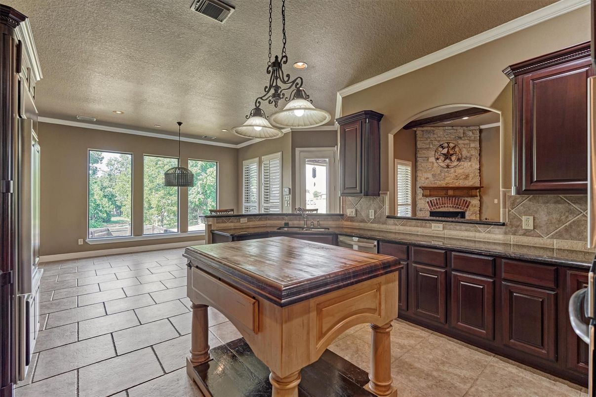 Fireplace, Interior, Kitchen, Pendant Lights, Recessed Lighting, Stone Walls