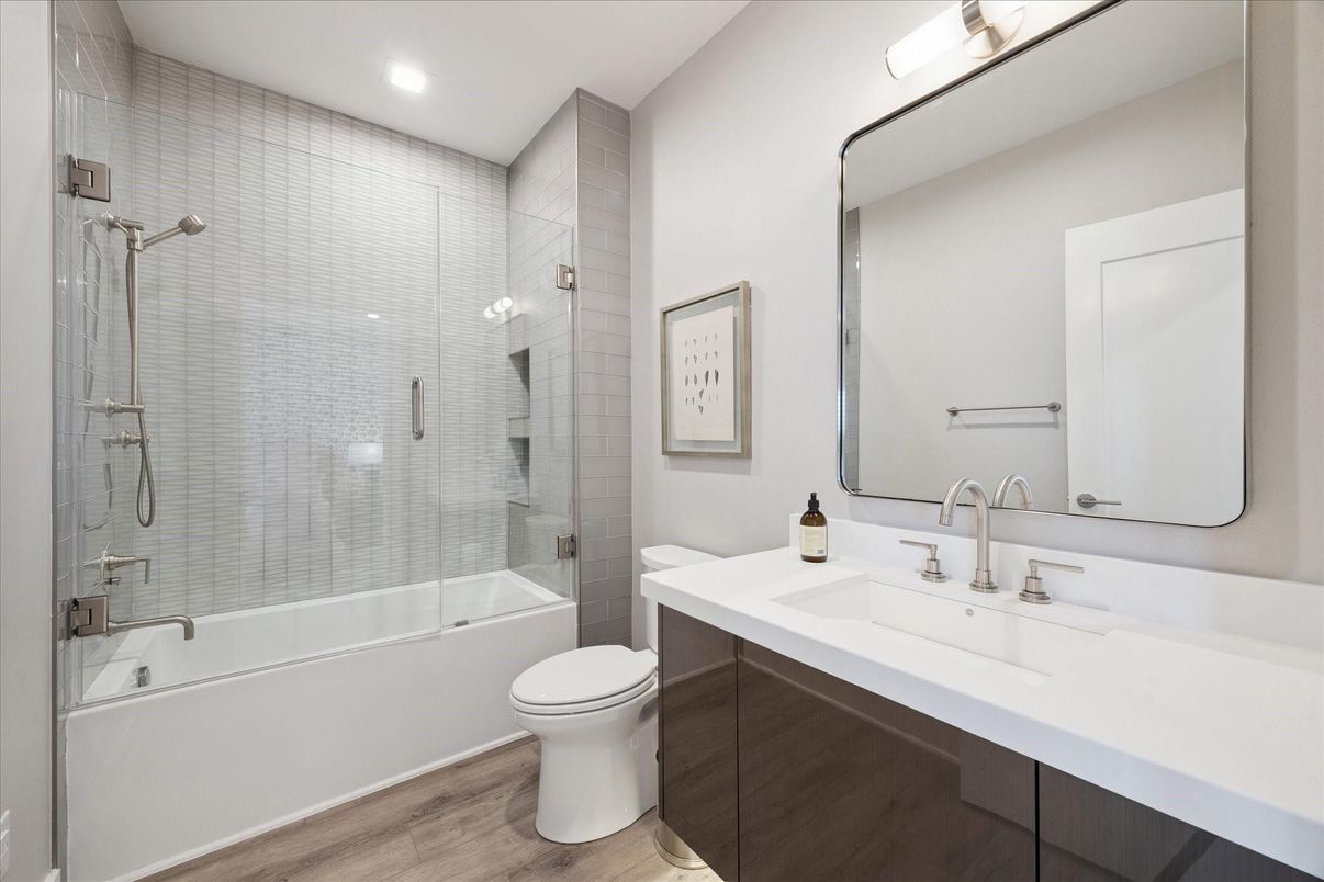Bathroom, Dual Sink Vanities, Glass Shower, Interior, Recessed Lighting, Wood Texture Flooring