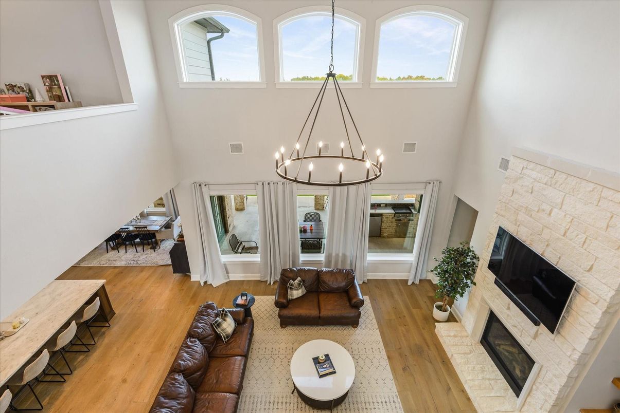 Chandelier, Dining room, Fireplace, Interior, Living room, Pendant Lights, Wood Texture Flooring