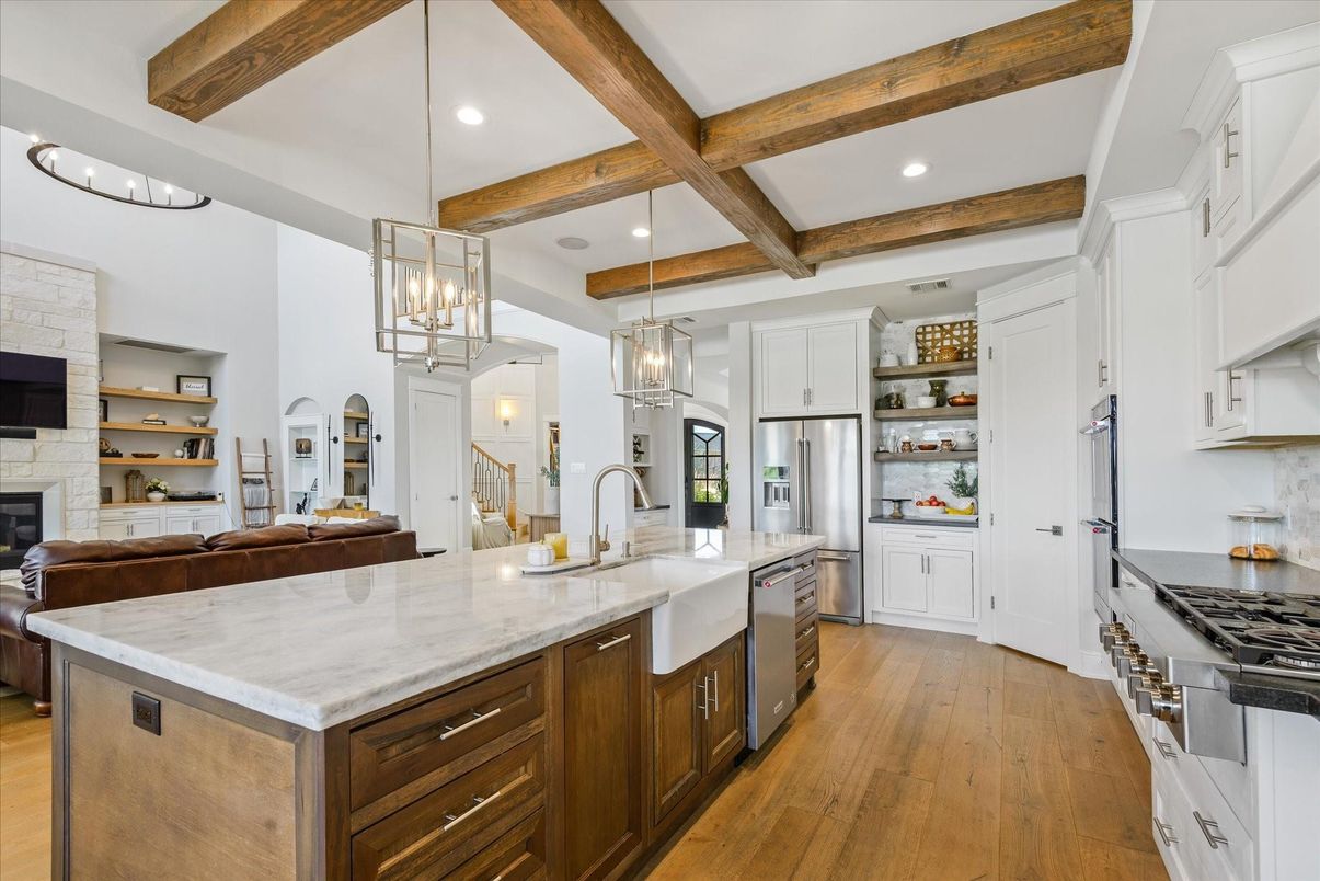 Fireplace, Interior, Kitchen, Pendant Lights, Recessed Lighting, Stainless Steel Appliances, Wooden Beams, Wood Texture Flooring