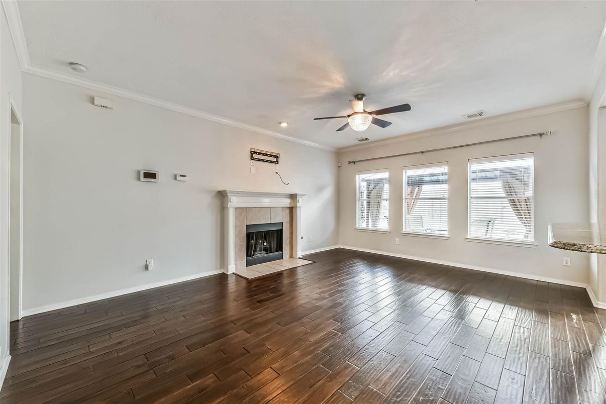 Empty room, Fireplace, Interior, Recessed Lighting, Wood Texture Flooring