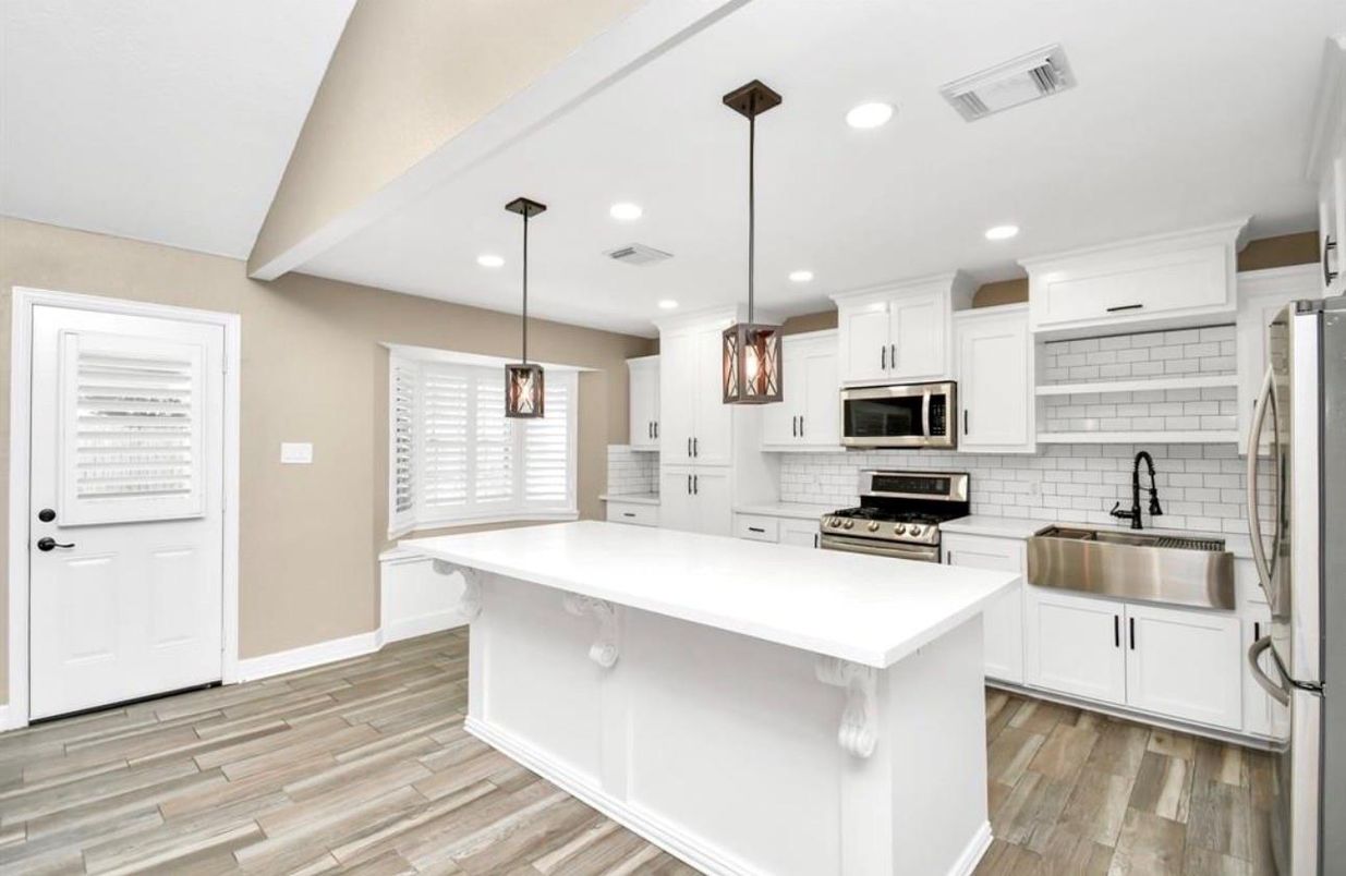 Interior, Kitchen, Pendant Lights, Recessed Lighting, Stainless Steel Appliances, Wood Texture Flooring
