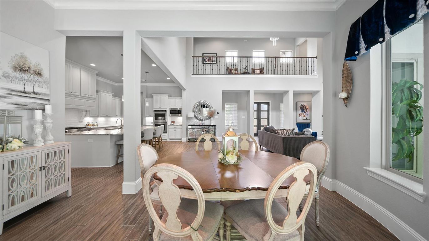 Dining room, Interior, Kitchen, Recessed Lighting, Stainless Steel Appliances, Wood Texture Flooring
