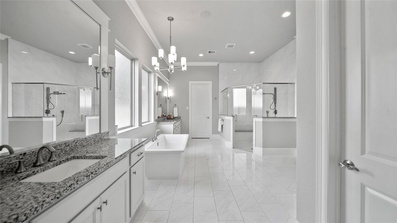 Bathroom, Dual Sink Vanities, Free Standing Baths, Glass Shower, Interior, Marble, Marble Walls, Pendant Lights, Recessed Lighting