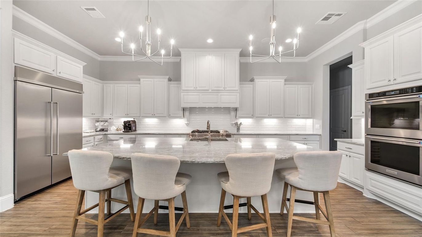 Chandelier, Interior, Kitchen, Pendant Lights, Recessed Lighting, Stainless Steel Appliances, Wood Texture Flooring