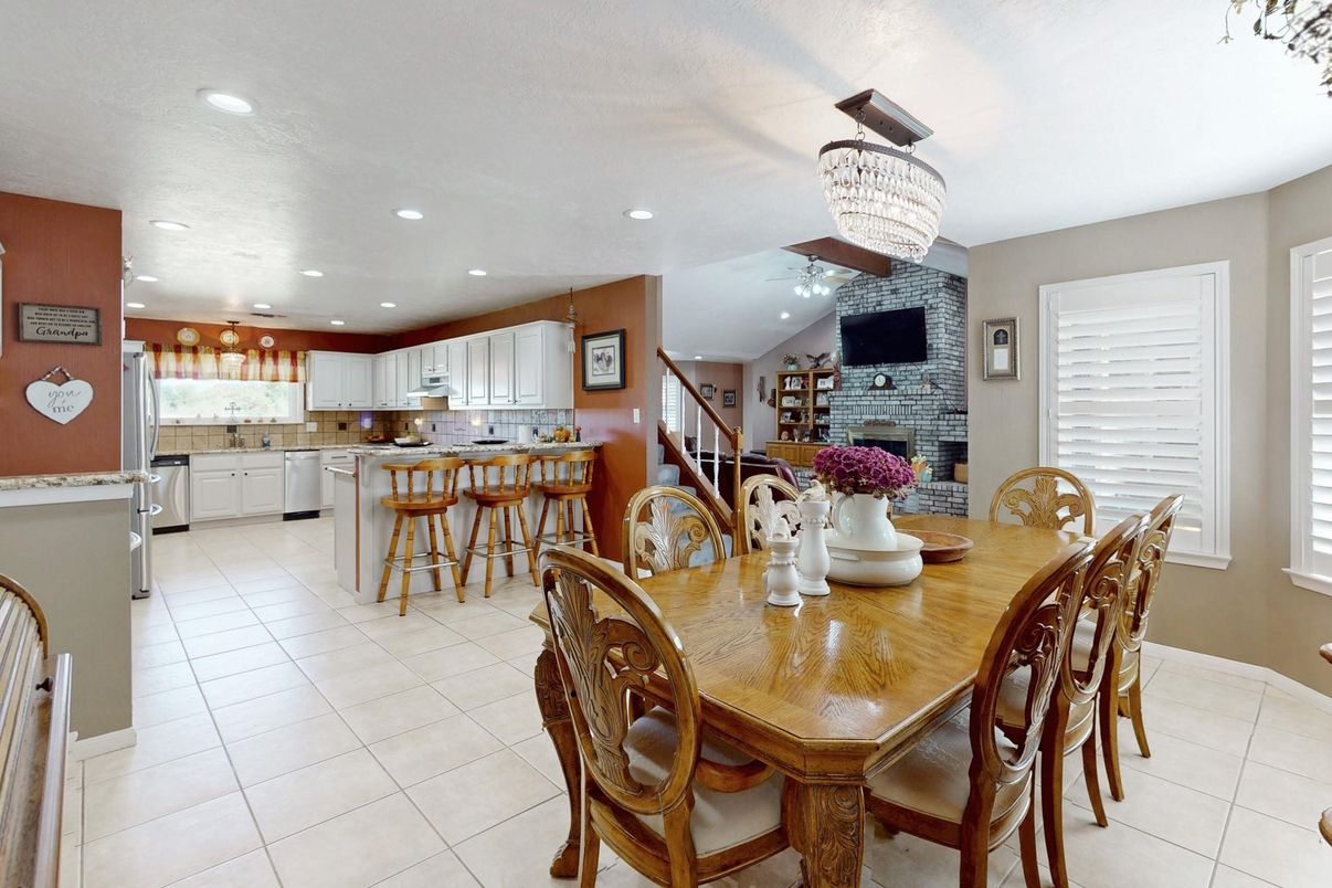 Chandelier, Dining room, Fireplace, Interior, Kitchen, Recessed Lighting, Stone Walls