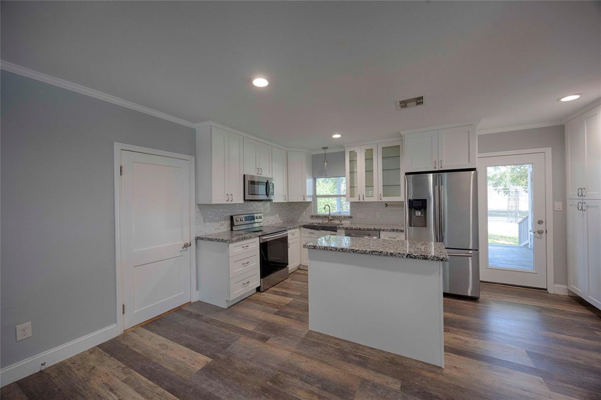 Interior, Kitchen, Recessed Lighting, Stainless Steel Appliances, Wood Texture Flooring