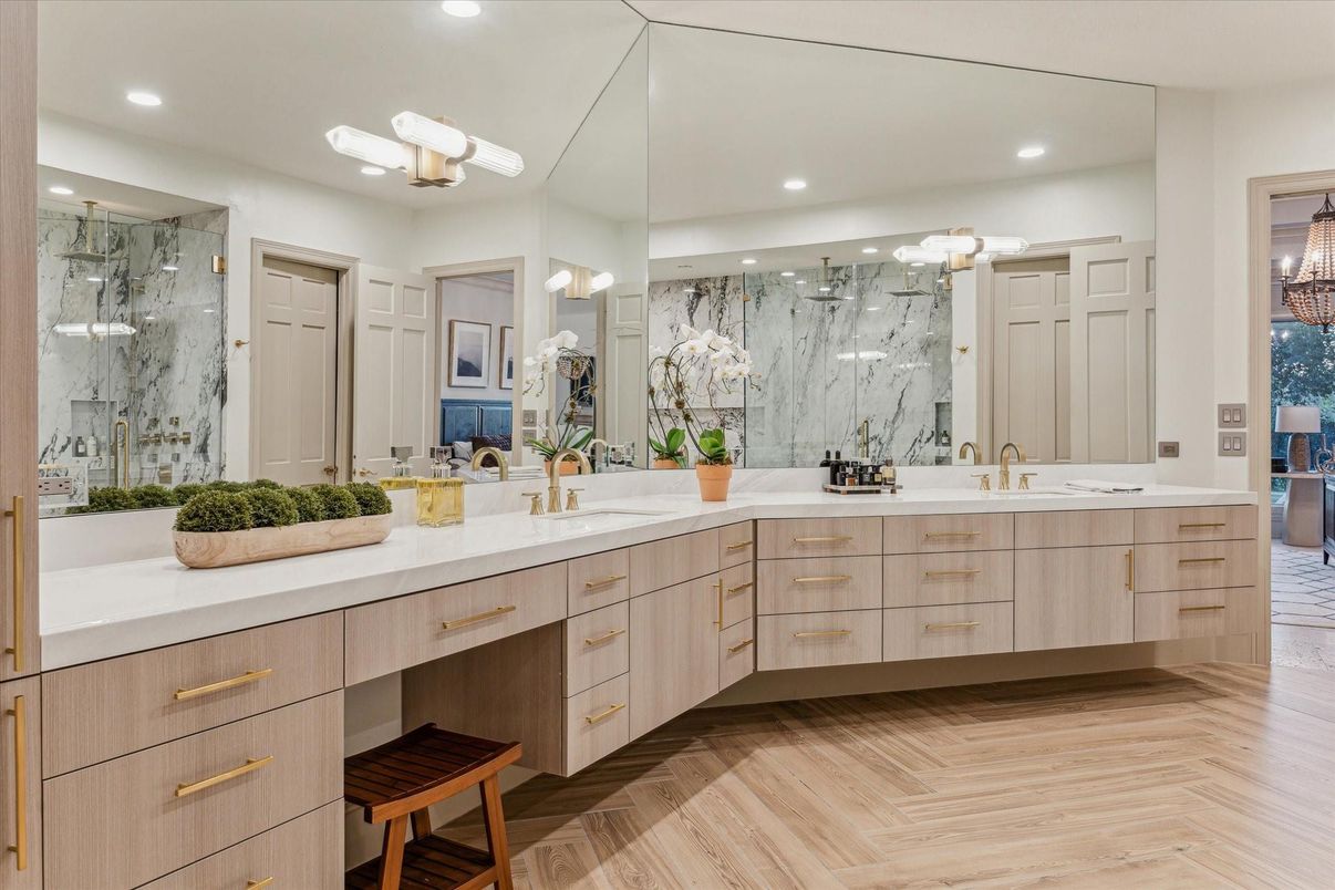 Bathroom, Dual Sink Vanities, Glass Shower, Interior, Marble Walls, Recessed Lighting, Wood Texture Flooring