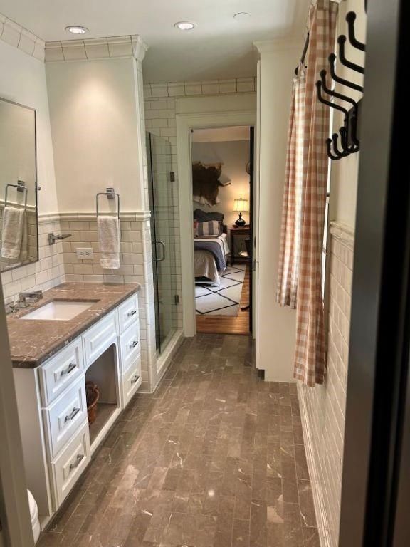 Bathroom, Bedroom, Dual Sink Vanities, Glass Shower, Interior, Recessed Lighting, Wood Texture Flooring