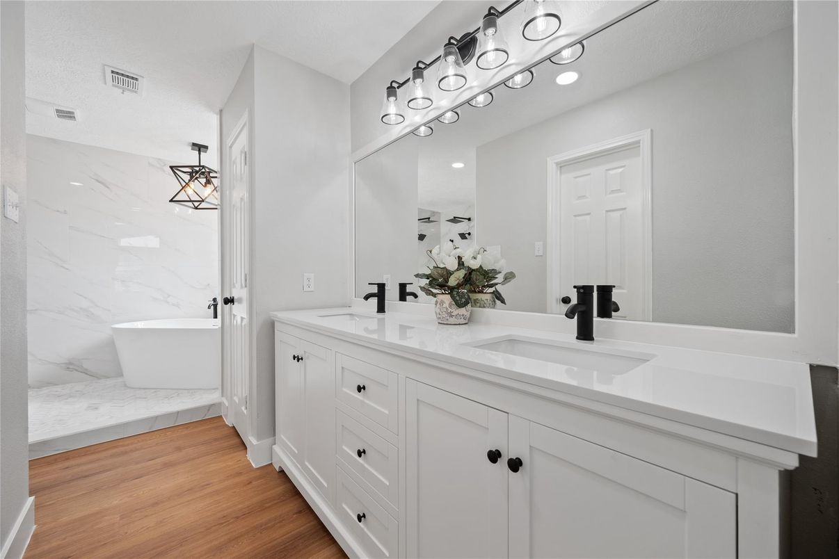 Bathroom, Dual Sink Vanities, Free Standing Baths, Interior, Marble, Marble Walls, Wood Texture Flooring