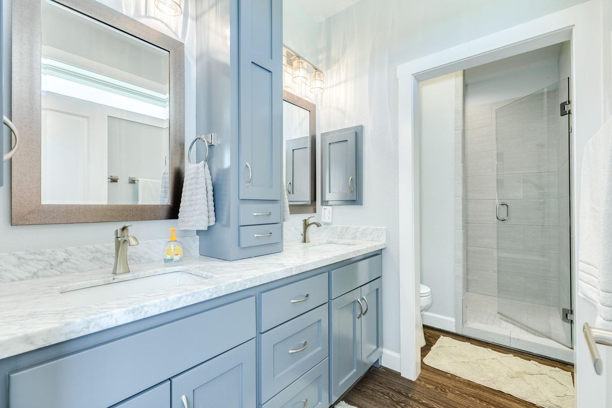 Bathroom, Dual Sink Vanities, Glass Shower, Interior, Wood Texture Flooring