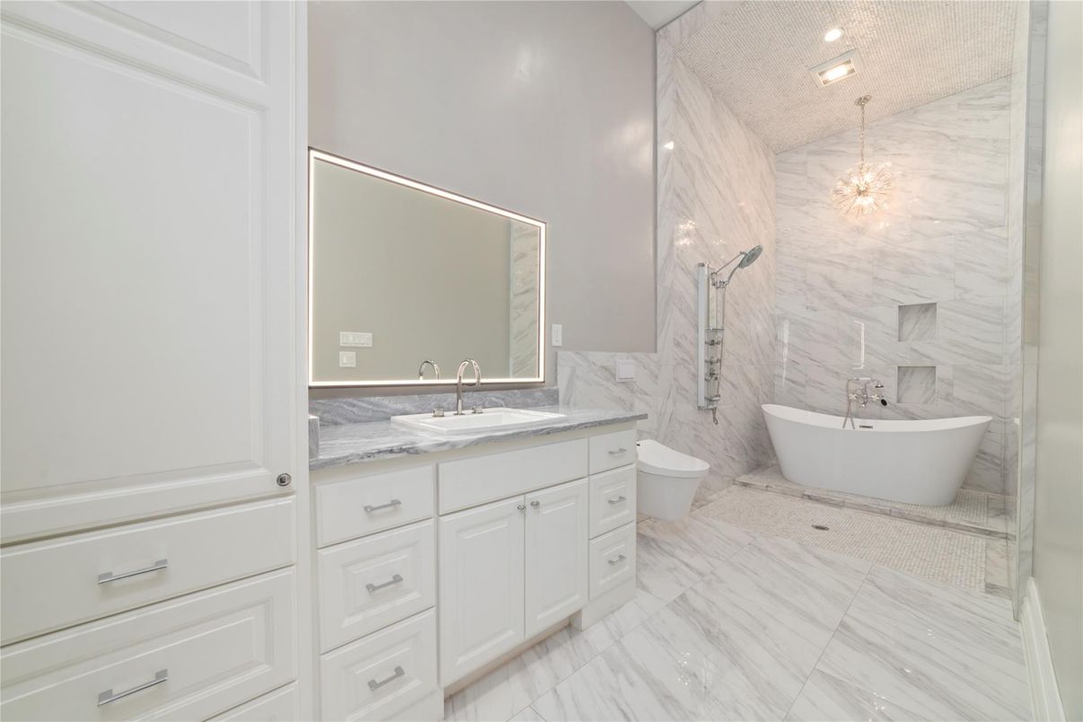 Bathroom, Dual Sink Vanities, Free Standing Baths, Interior, Marble, Marble Walls, Recessed Lighting
