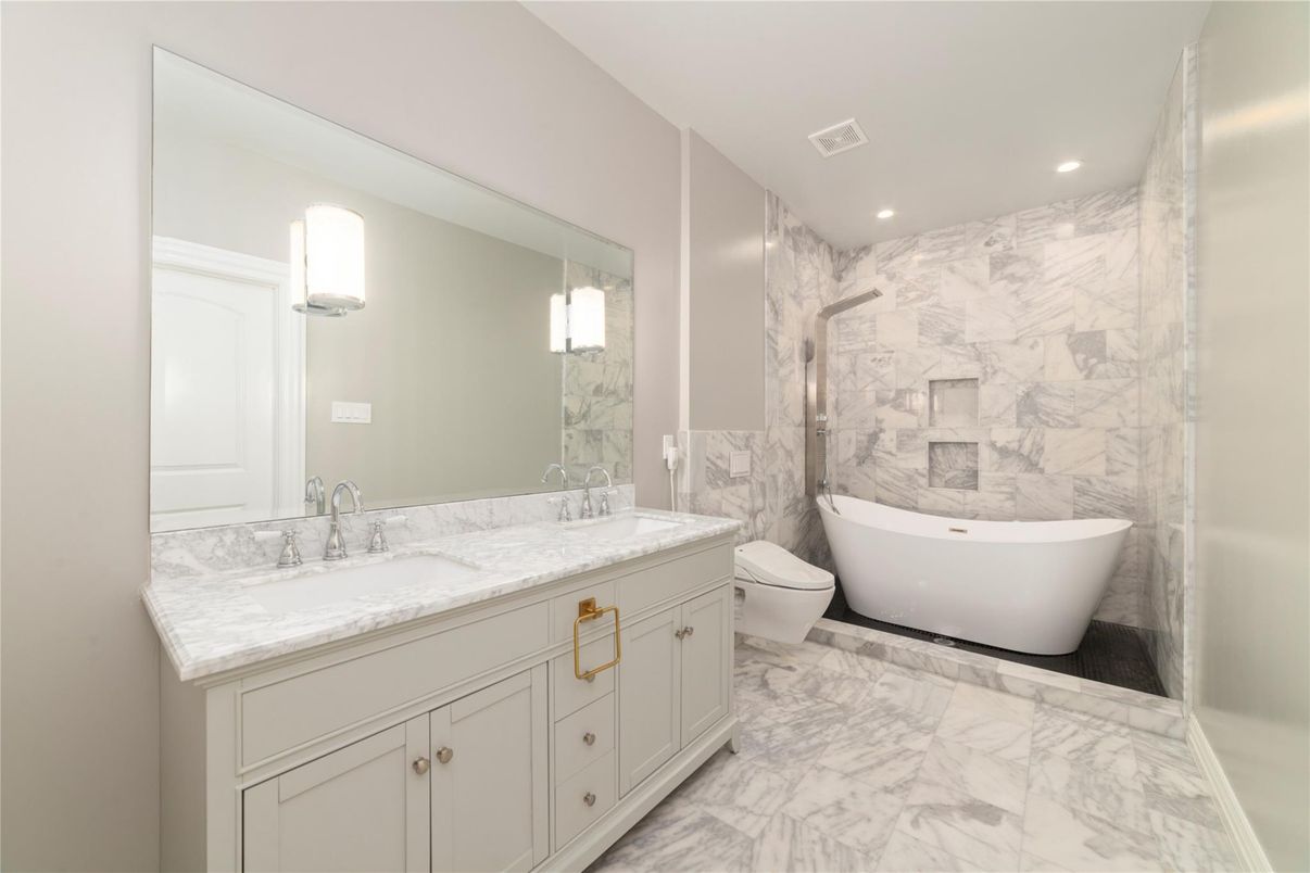Bathroom, Dual Sink Vanities, Free Standing Baths, Interior, Marble, Marble Walls, Recessed Lighting