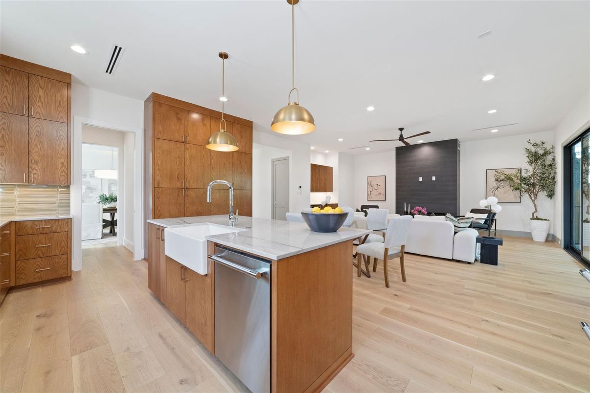 Dining room, Fireplace, Interior, Kitchen, Living room, Pendant Lights, Recessed Lighting, Stainless Steel Appliances, Wood Texture Flooring