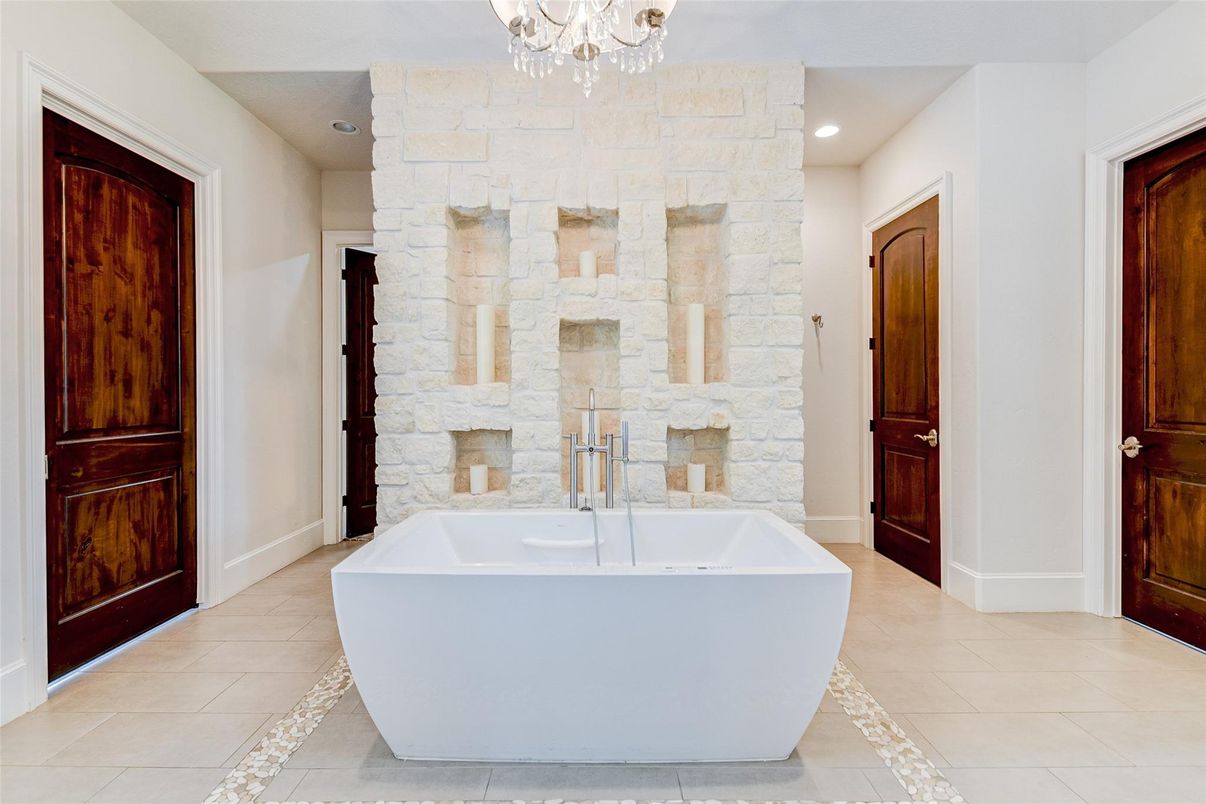Bathroom, Free Standing Baths, Interior, Recessed Lighting, Stone Walls