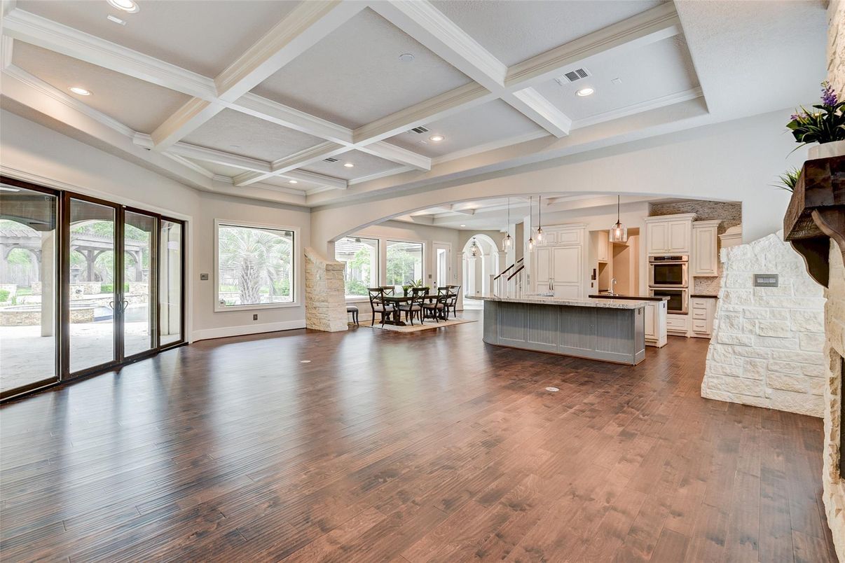 Dining room, Interior, Kitchen, Pendant Lights, Recessed Lighting, Stainless Steel Appliances, Wood Texture Flooring