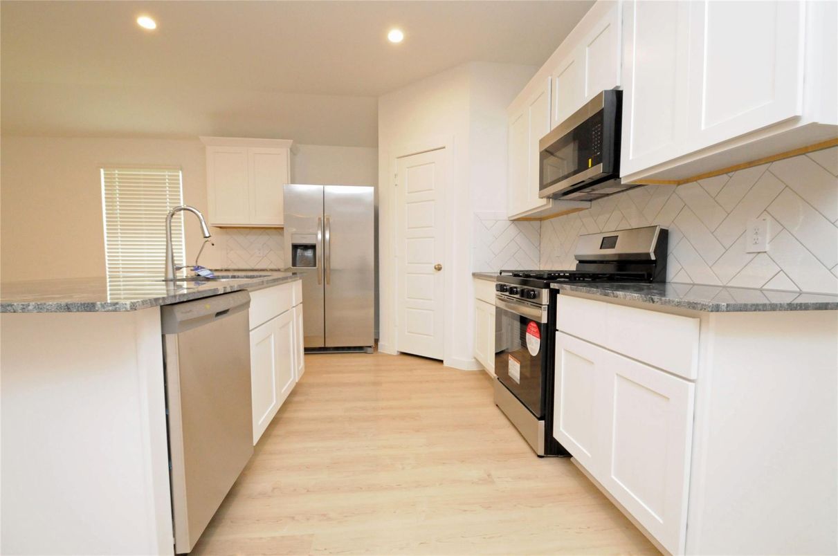 Interior, Kitchen, Recessed Lighting, Stainless Steel Appliances, Wood Texture Flooring