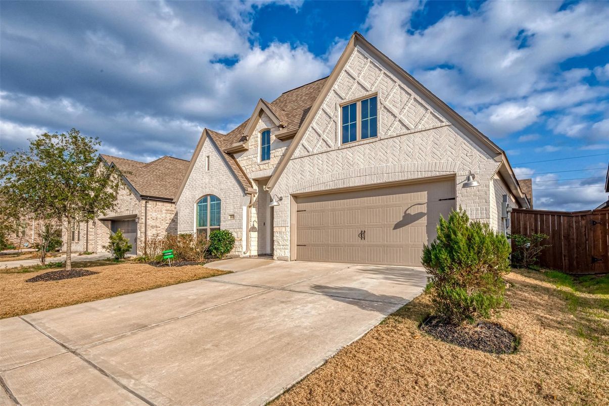 Attached, Exterior, Facade, Brick Facade, Tudor Revival