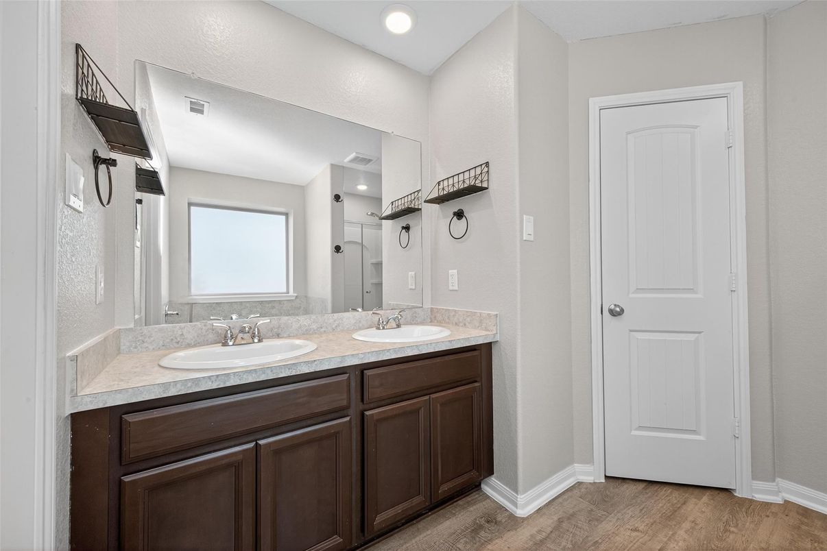 Bathroom, Dual Sink Vanities, Interior, Recessed Lighting, Wood Texture Flooring