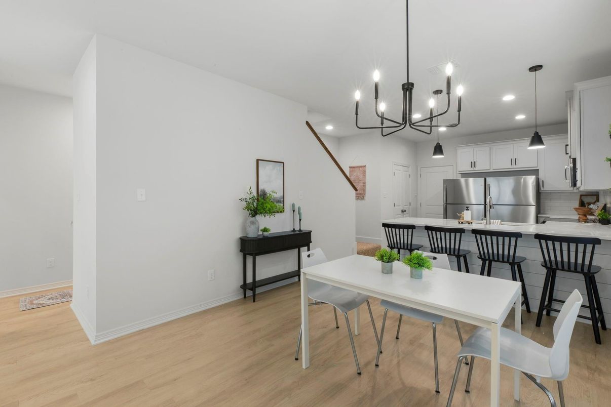 Chandelier, Dining room, Interior, Kitchen, Pendant Lights, Recessed Lighting, Stainless Steel Appliances, Wood Texture Flooring