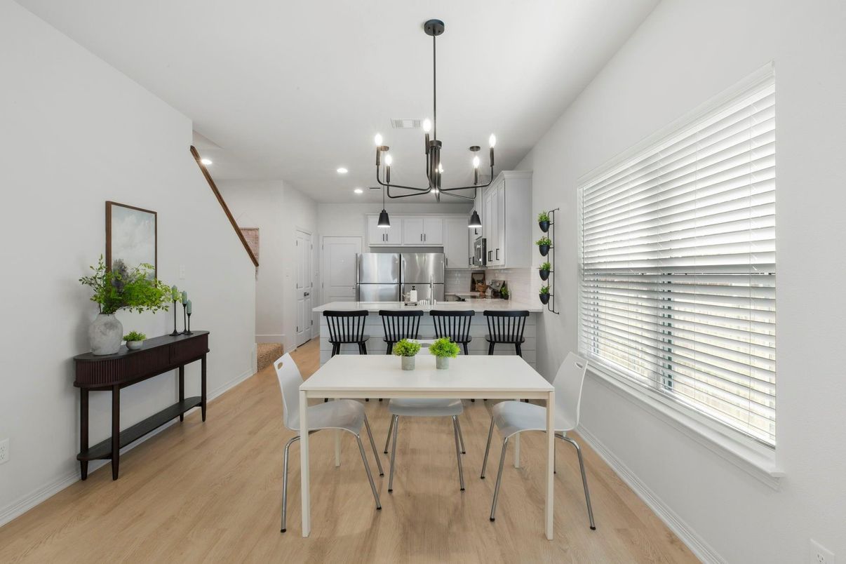 Chandelier, Dining room, Interior, Kitchen, Pendant Lights, Recessed Lighting, Stainless Steel Appliances, Wood Texture Flooring