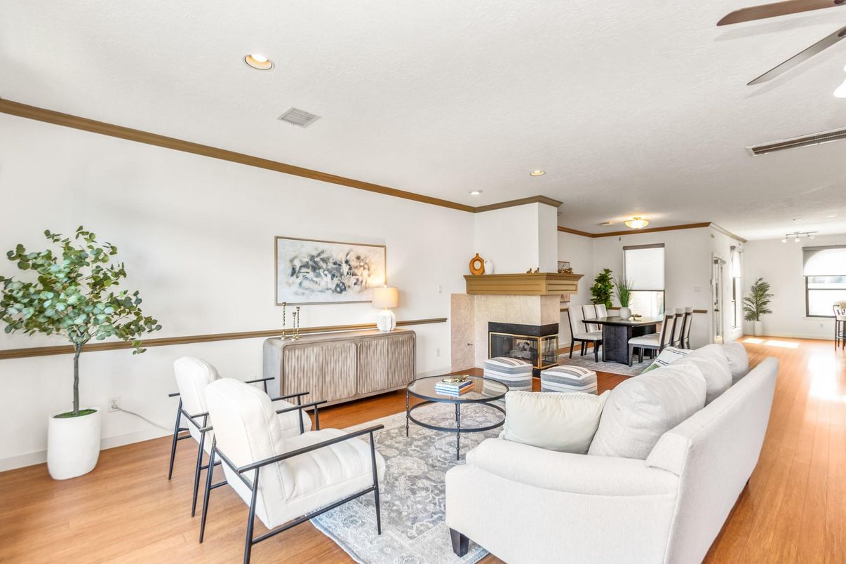 Dining room, Fireplace, Interior, Living room, Recessed Lighting, Wood Texture Flooring