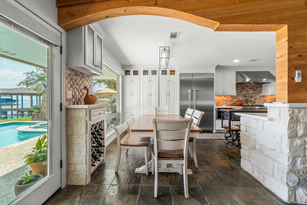 Dining room, Interior, Kitchen, Recessed Lighting, Stainless Steel Appliances, Stone Walls, Wooden Beams