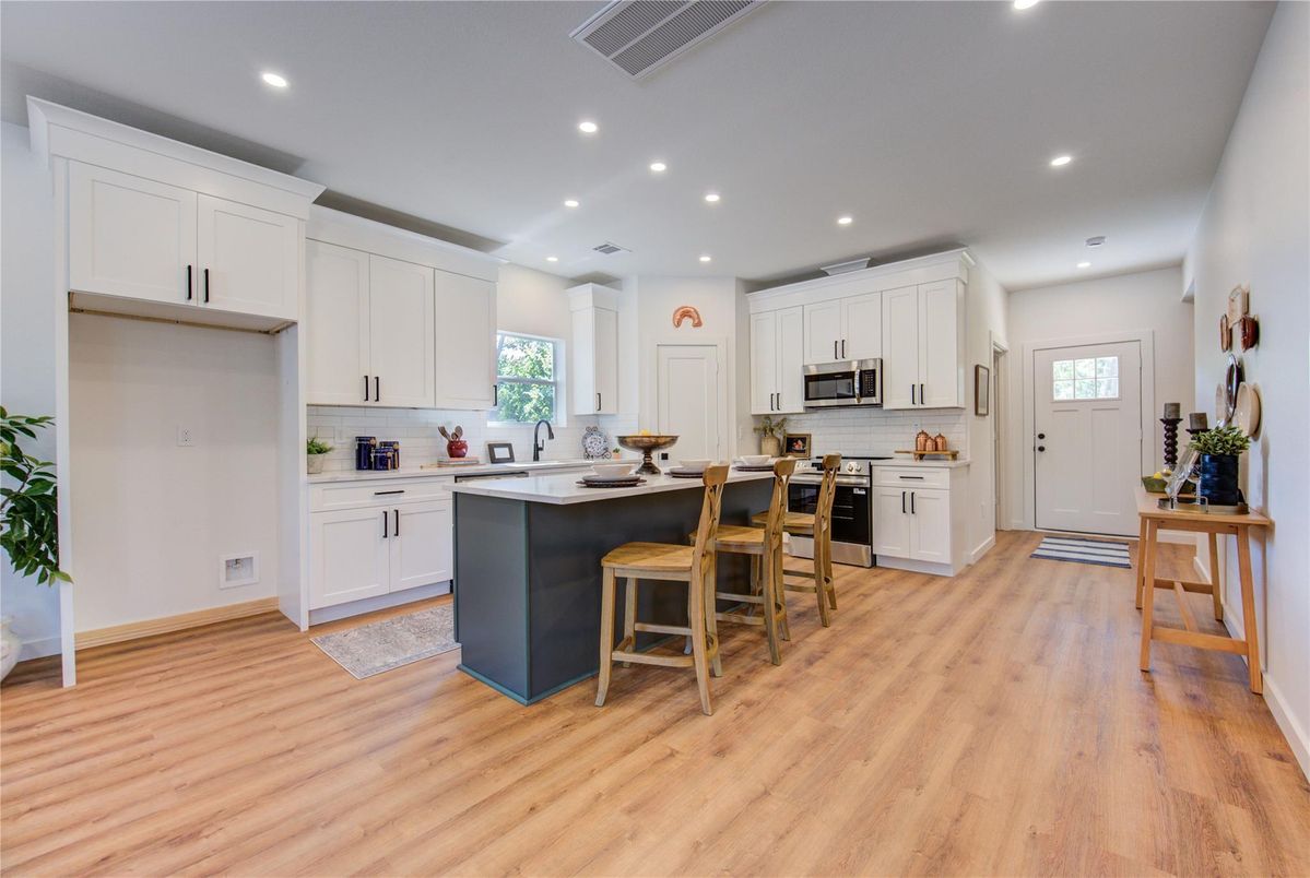 Interior, Kitchen, Recessed Lighting, Stainless Steel Appliances, Wood Texture Flooring