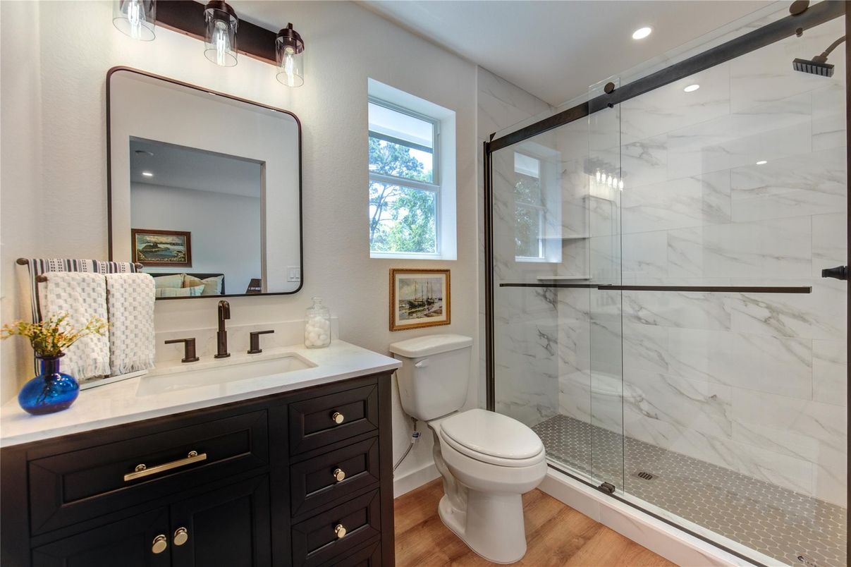 Bathroom, Bedroom, Glass Shower, Interior, Marble Walls, Recessed Lighting, Wood Texture Flooring