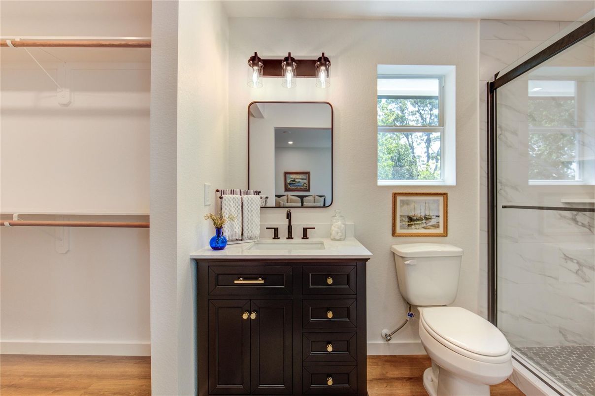 Bathroom, Glass Shower, Interior, Marble Walls, Wood Texture Flooring