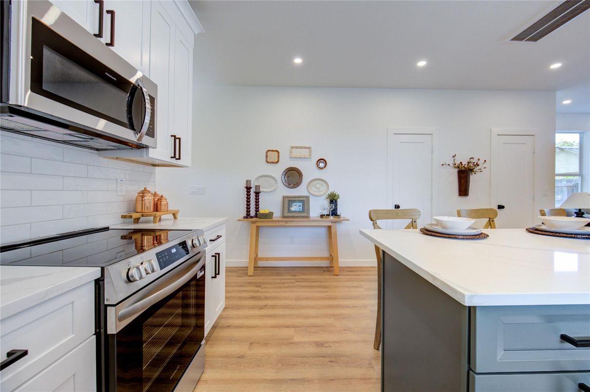 Interior, Kitchen, Recessed Lighting, Stainless Steel Appliances, Wood Texture Flooring