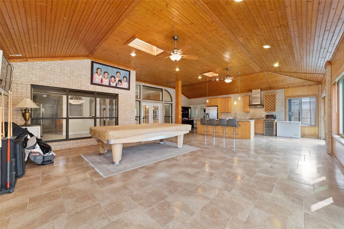 Billiard Table, Game Room, Interior, Kitchen, Recessed Lighting, Stainless Steel Appliances, Stone Walls, Wooden Ceilings