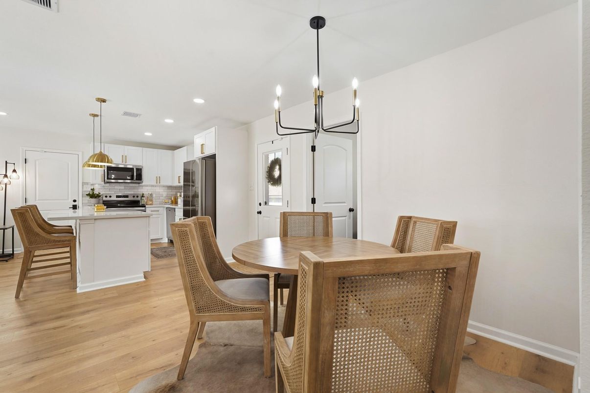 Chandelier, Dining room, Interior, Kitchen, Pendant Lights, Recessed Lighting, Stainless Steel Appliances, Wood Texture Flooring