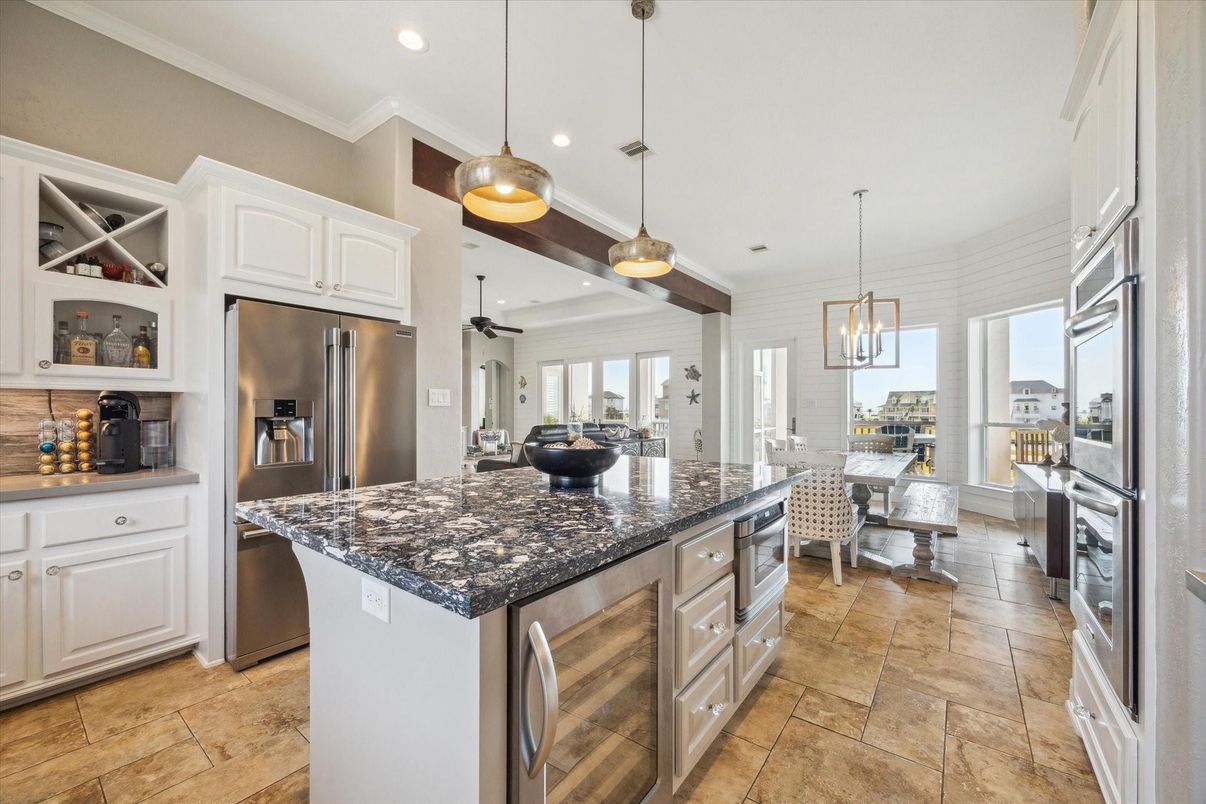 Chandelier, Dining room, Interior, Kitchen, Pendant Lights, Recessed Lighting, Stainless Steel Appliances, Wooden Beams